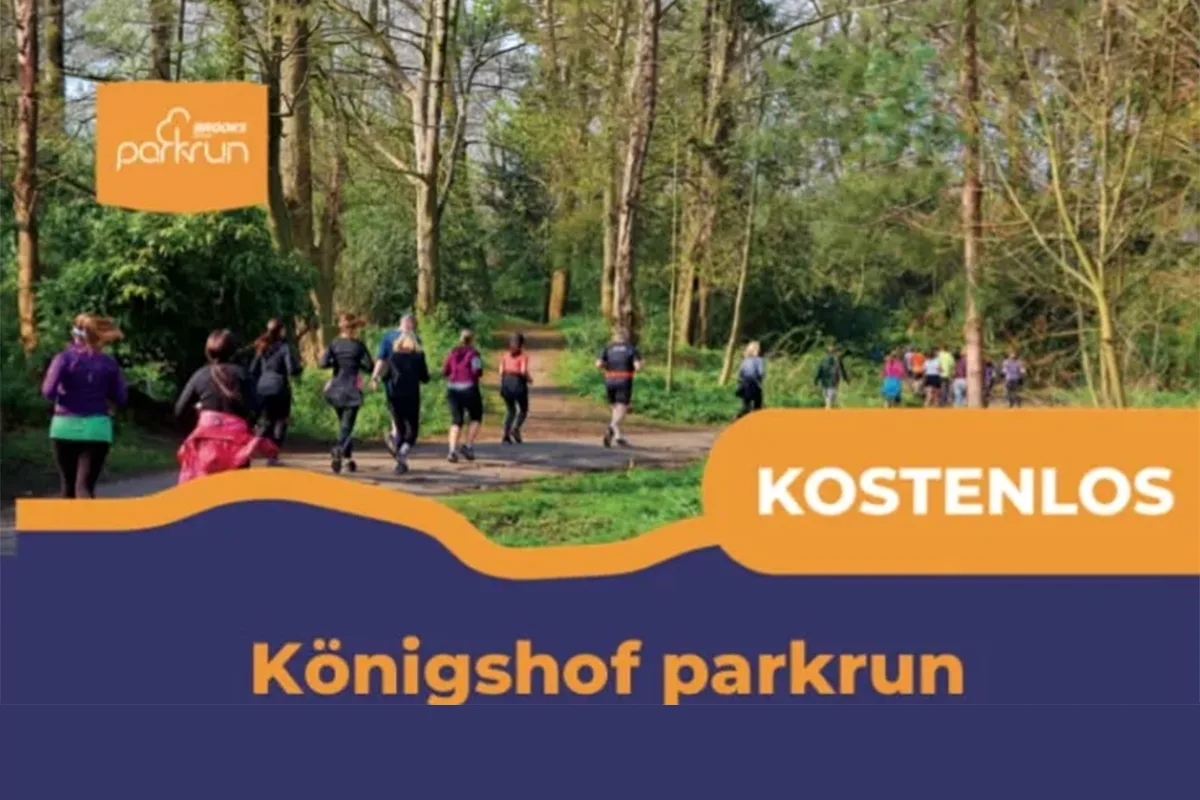 Runners on a woodland path for Königshof parkrun; large orange 'KOSTENLOS' banner and Königshof parkrun logo in the scene (free event).