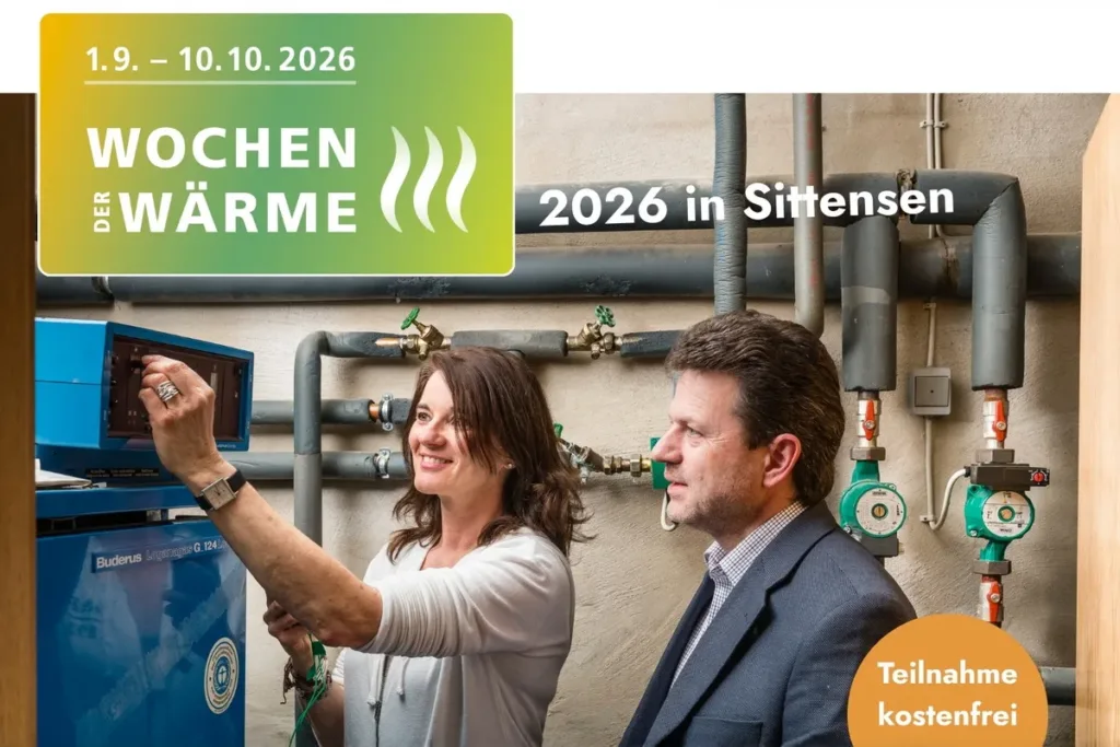 Event banner for 'Woche der Wärme' (1.9–10.10.2026) with two people inspecting heating equipment; badge reads 'Teilnahme kostenfrei'.